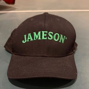 Jameson Black trucker hat with Green Embroidery